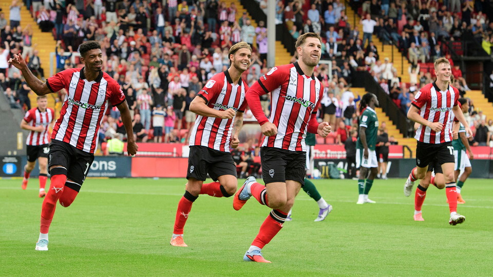 City celebrate one of James Collins' goals against Plymouth Argyle