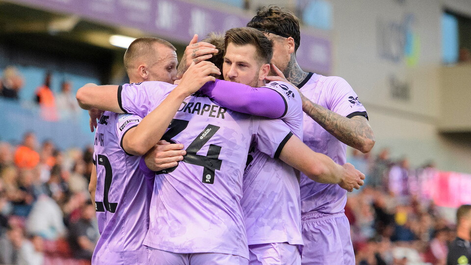 City celebrate Freddie Draper's goal at Northampton Town