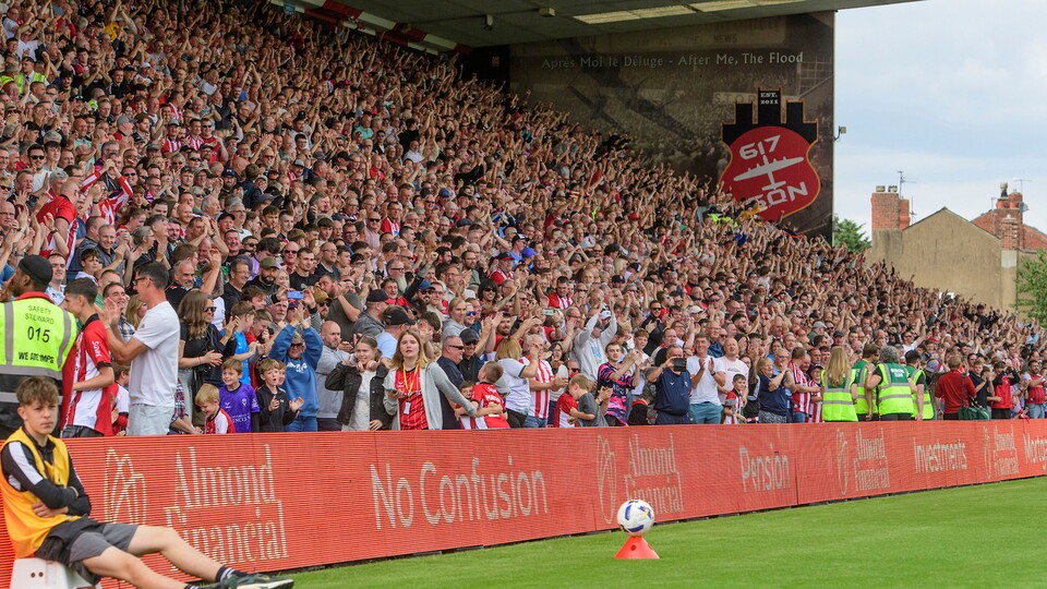 Supporters in the GBM Stand at the LNER Stadium