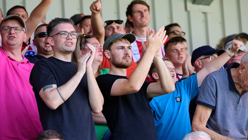 Lincoln City fans at the away game at AFC Wimbledon.