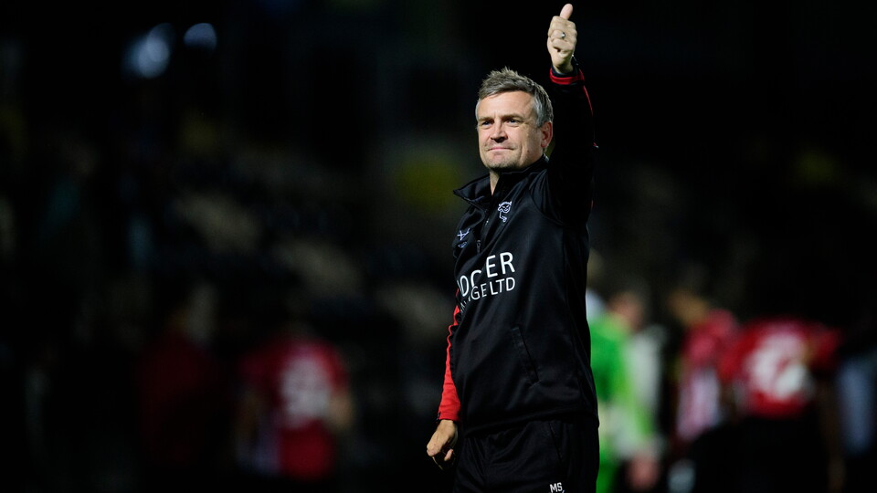 Michael Skubala gives a thumbs up with his left hand