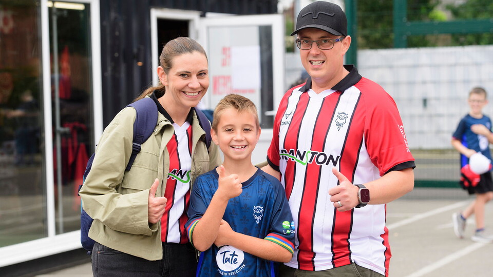 Fans in the Fan Village at the LNER Stadiium
