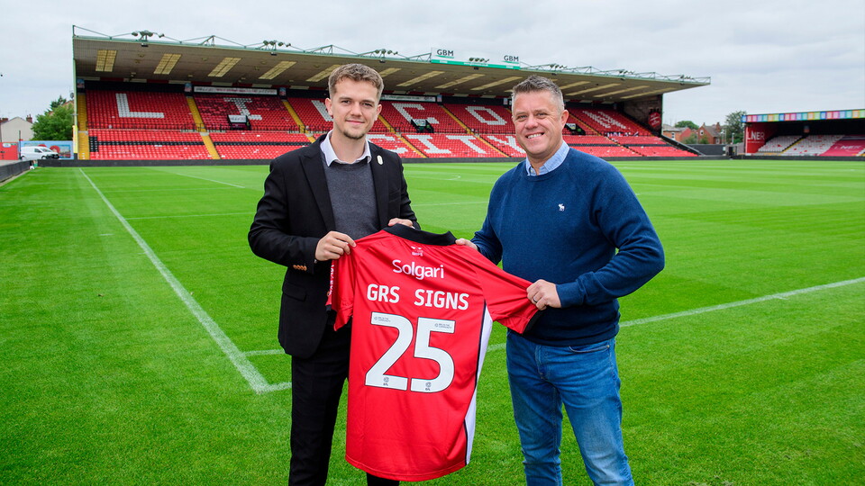 Lincoln City commercial partnership - Bobby Copping, head of commercial of Lincoln City, left, with Steve Wilson, managing director of GRS Signs