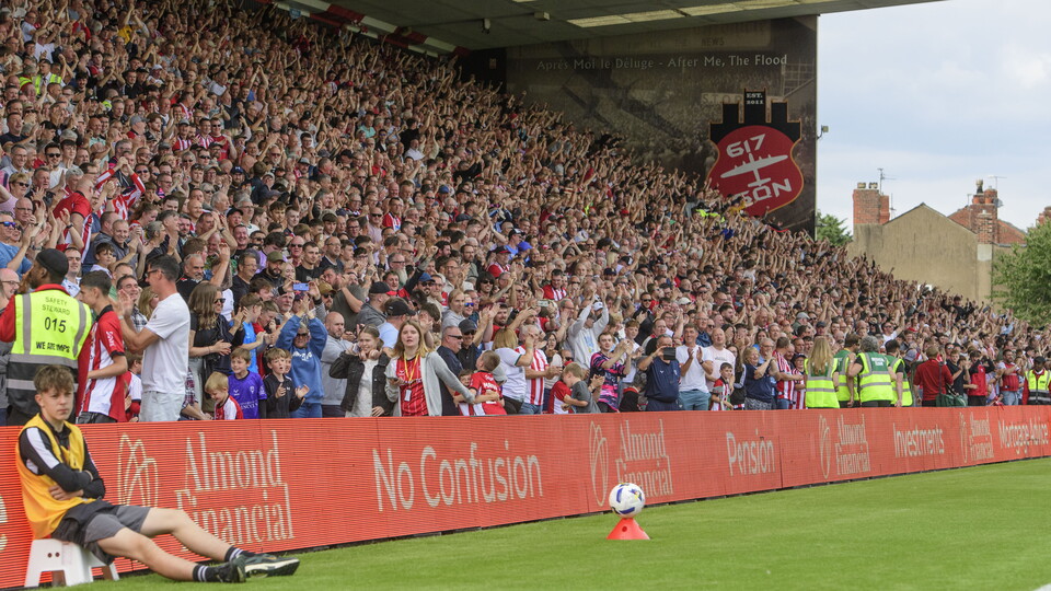 Supporters stood in the GBM Stand at the LNER Stadium