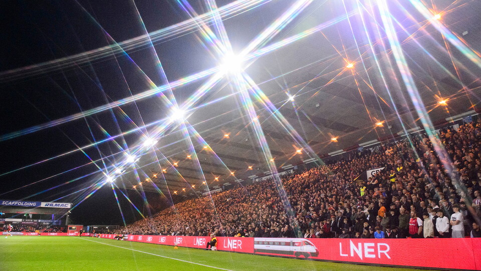 A photo of the LNER Stadium under the floodlights