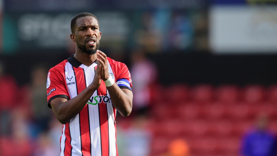 Tendayi Darikwa of Lincoln City applauds the fans at the final whistle following the EFL Sky Bet League One match between Lincoln City and Wigan Athletic at LNER Stadium, Lincoln.