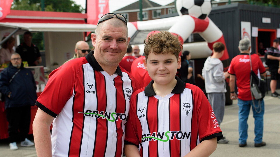 Lincoln City Lincoln City fans in the fan village prior to the EFL Sky Bet League One match between Lincoln City and Wigan Athletic at LNER Stadium, Lincoln.