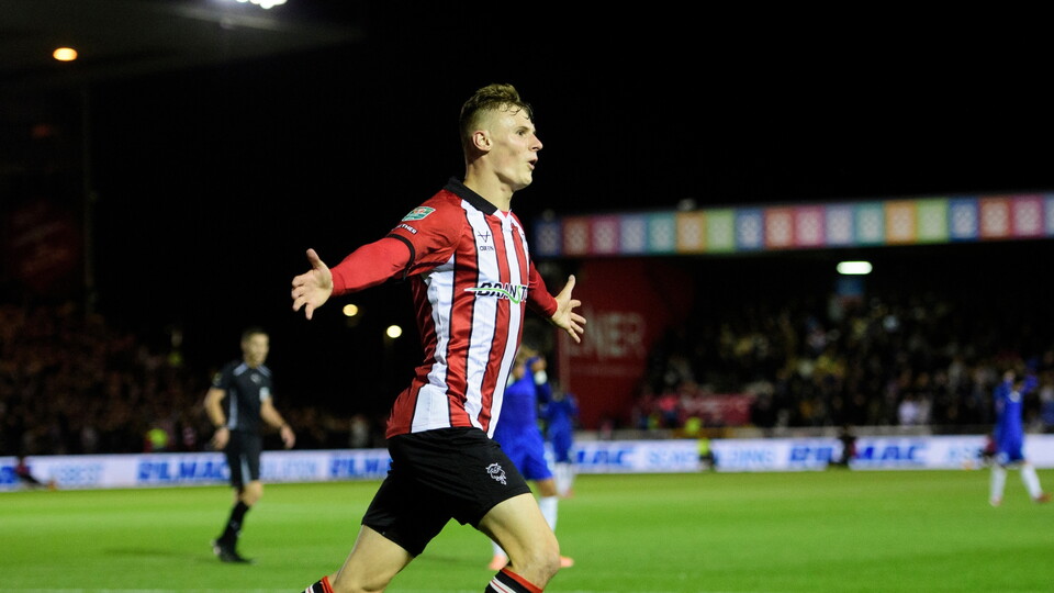 Rob Street of Lincoln City celebrates scoring the opening goal during the Carabao Cup third round match between Lincoln City and Chelsea at LNER Stadium, Lincolnshire.