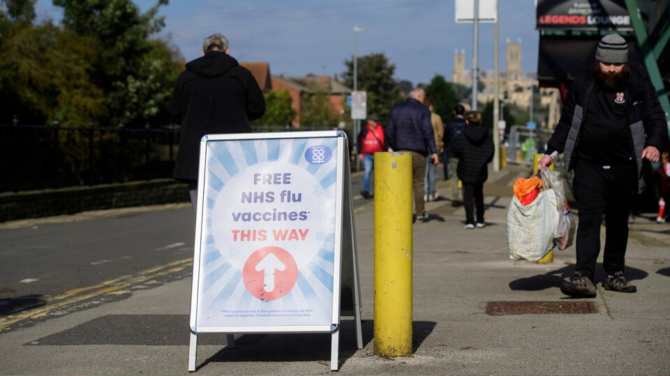 An advert for free NHS flu jabs outside the stadium prior to the EFL Sky Bet League One match between Lincoln City and Leyton Orient at LNER Stadium, Lincoln.