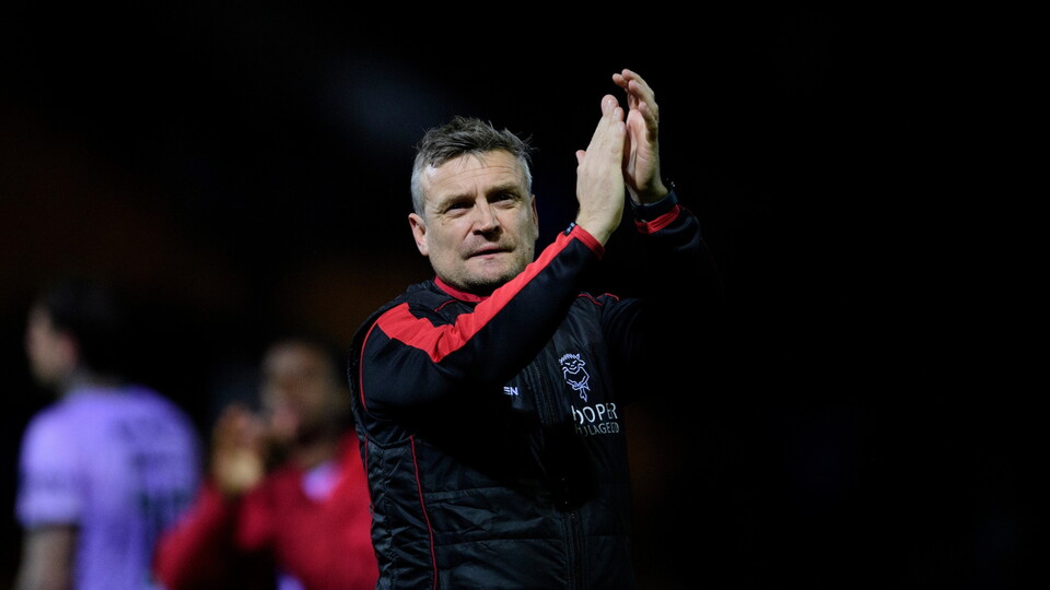 Michael Skubala, head coach of Lincoln City applauds the fans at the final whistle following the EFL Sky Bet League One match between Bradford City and Lincoln City at University of Bradford Stadium, Bradford.