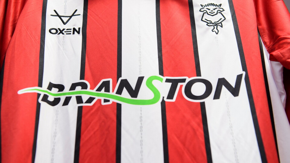 The EFL Sky Bet League One sleeve patch on a Lincoln City home shirt in the changing room prior to the EFL Sky Bet League One match between Lincoln City and Exeter City at LNER Stadium, Lincoln.