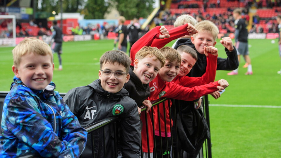 Lincoln City fans enjoy the pre-match atmosphere prior to the EFL Sky Bet League One match between Lincoln City and Exeter City at LNER Stadium, Lincoln.