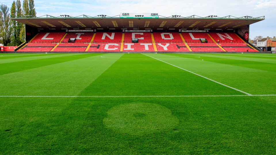 A image of a Poppy brushed into the pitch prior to the EFL Sky Bet League One match between Lincoln City and Stockport County at LNER Stadium, Lincoln.