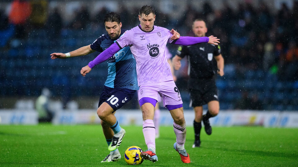 James Collins battles away for City at Wycombe Wanderers