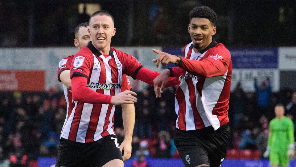 Reeco Hackett and Jack Moylan celebrate the winning goal against Port Vale