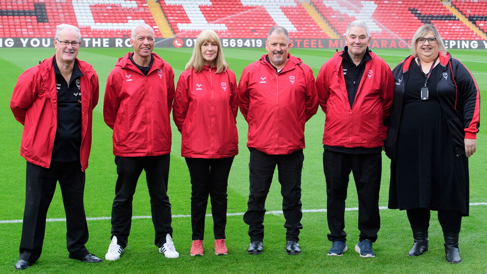 Lincoln City's supporter liaison officer team pictured in the LNER Stadium