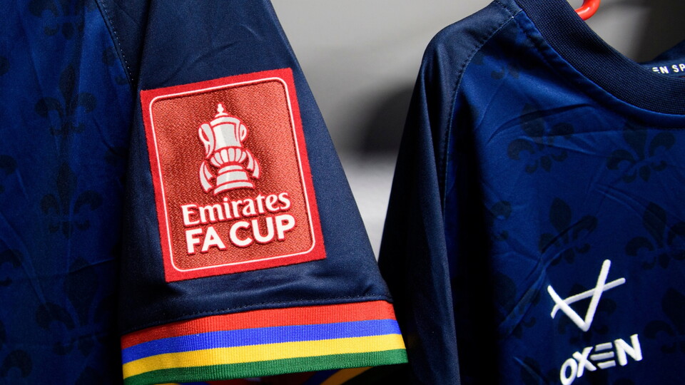 An Emirates FA Cup sleeve patch on a Lincoln City away shirt in the changing room prior to the Emirates FA Cup first round match between Salford City and Lincoln City at Peninsula Stadium, Salford.
