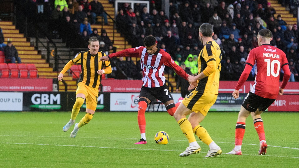 Reeco Hackett of Lincoln City celebrates scoring the opening goal during the EFL Sky Bet League One match between Lincoln City and Port Vale at LNER Stadium, Lincoln.