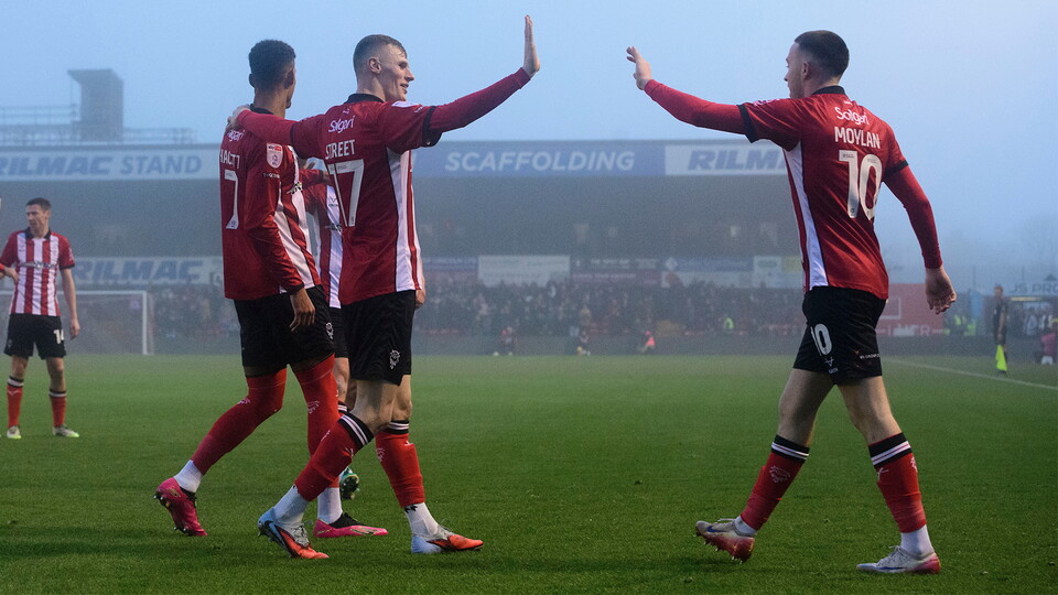 The Imps celebrate scoring against Cardiff City