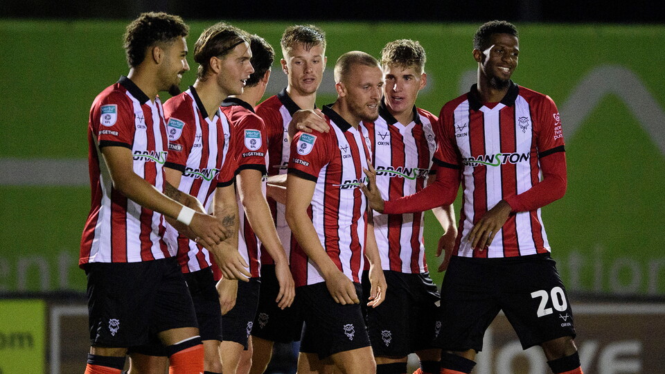 The Imps celebrate scoring against Manchester United U21s