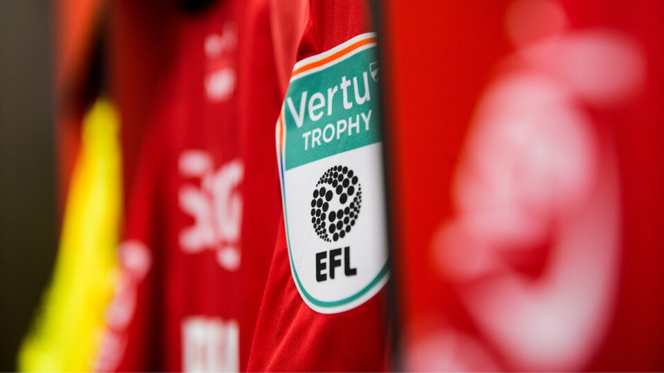 The Vertu Trophy arm patch on a Lincoln City home shirt in the changing room prior to the Vertu Trophy Northern Section group D match between Lincoln City and Notts County at LNER Stadium, Lincoln.