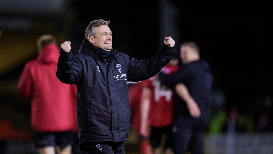 Michael Skubala, head coach of Lincoln City celebrates following the EFL Sky Bet League One match between Lincoln City and Barnsley at LNER Stadium, Lincoln.