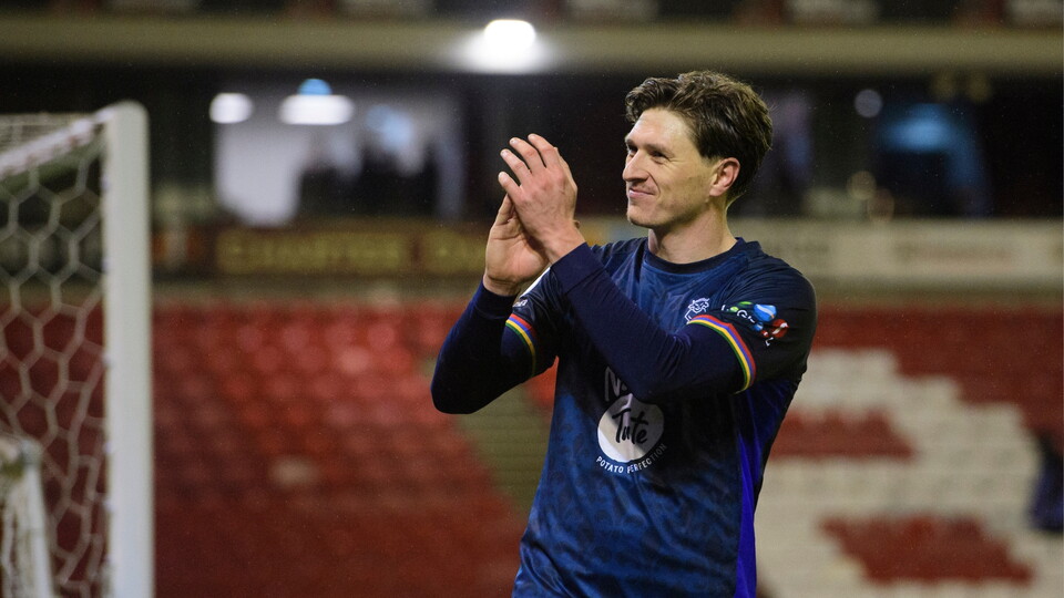 Adam Reach of Lincoln City applauds the fans at the final whistle following the EFL Sky Bet League One match between Barnsley and Lincoln City at Oakwell Stadium, Barnsley.