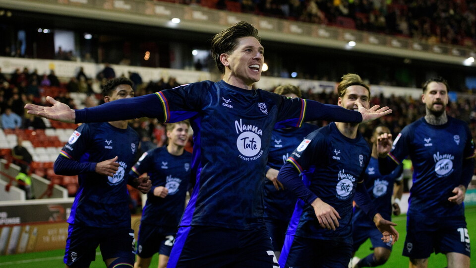 Adam Reach of Lincoln City celebrates scoring his side's second goal during the EFL Sky Bet League One match between Barnsley and Lincoln City at Oakwell Stadium, Barnsley.