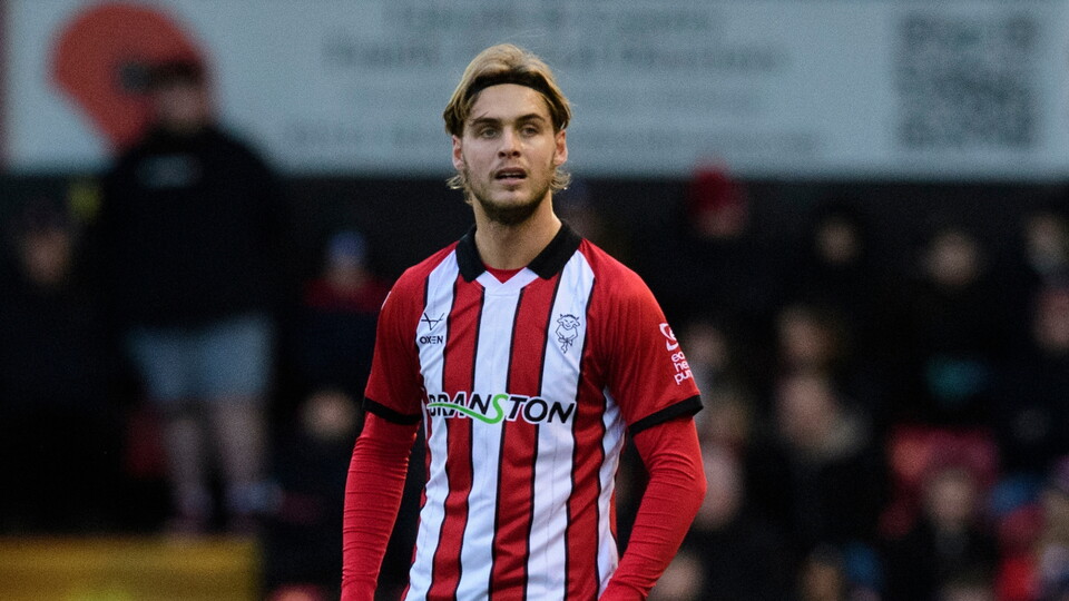 Ryley Towler of Lincoln City during the EFL Sky Bet League One match between Lincoln City and Huddersfield Town at LNER Stadium, Lincoln.