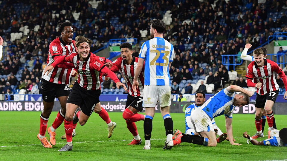 Ryley Towler wheels away to celebrate his goal