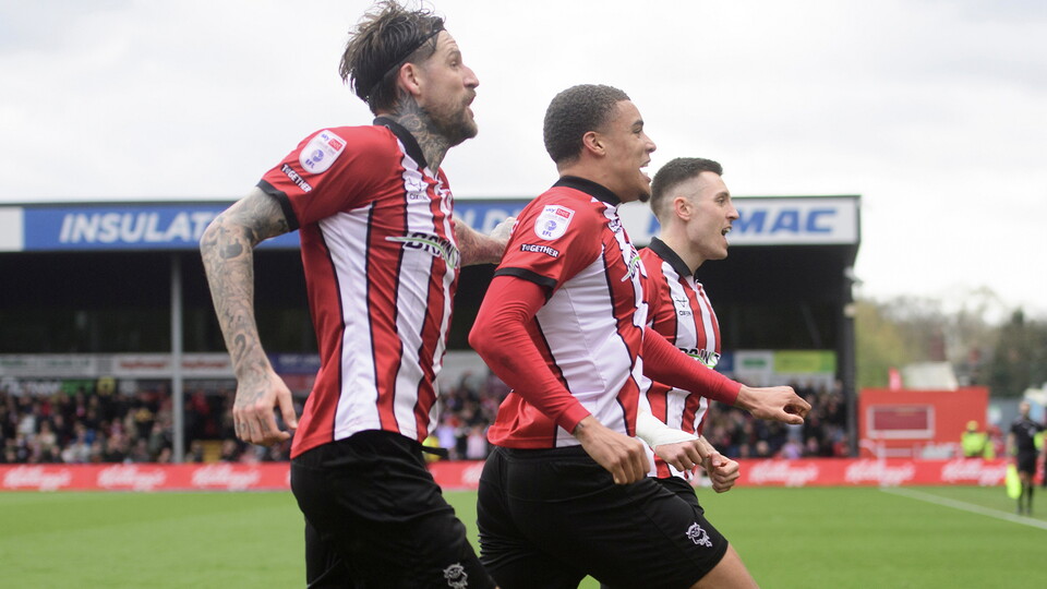 The Imps celebrate a late winner against AFC Wimbledon