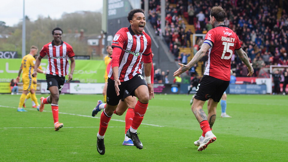 Alfie Lloyd celebrates a goal at the LNER Stadium