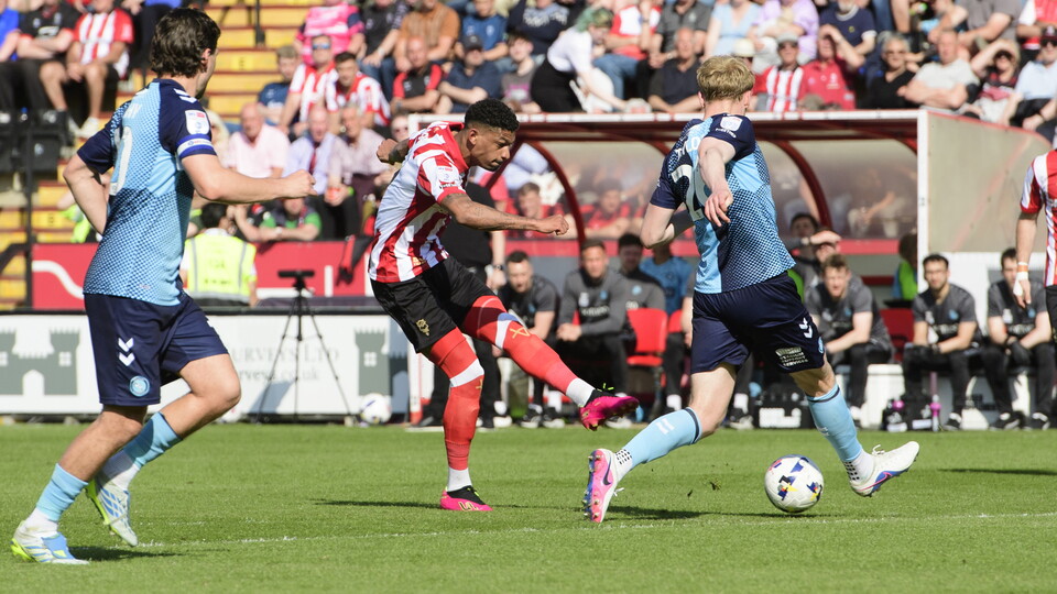 Reeco Hackett shoots with his left foot
