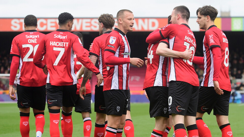 Lincoln City celebrate their second goal against Leyton Orient