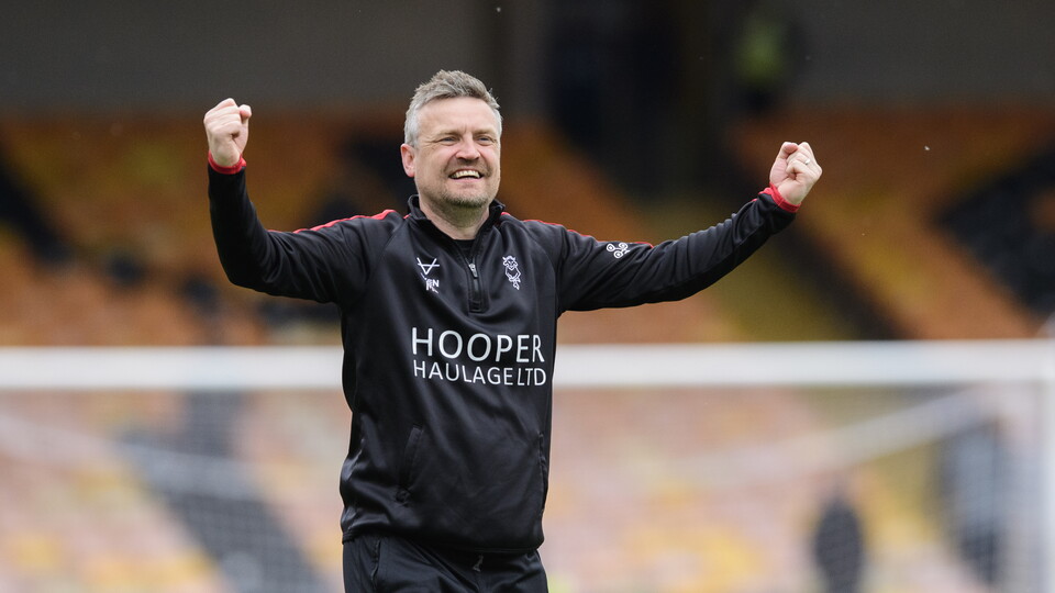 Michael Skubala celebrates the win at Port Vale