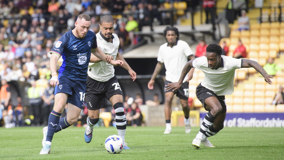 Ben House runs with the ball before scoring to put Lincoln City into a 1-0 lead at Port Vale