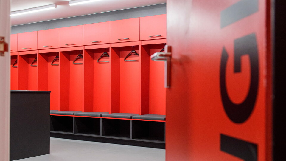 A look inside the home changing room through a door.