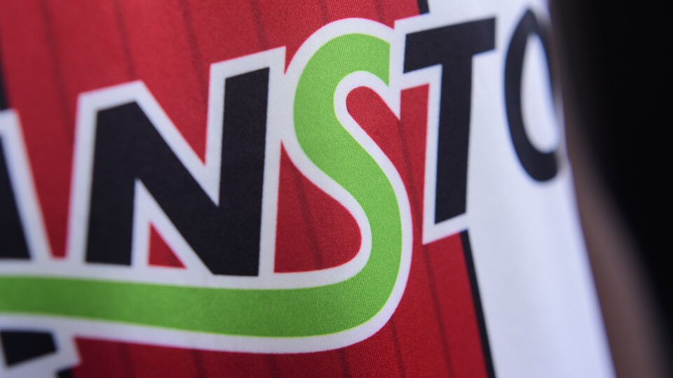 A close up of the Branston logo on a Lincoln City shirt