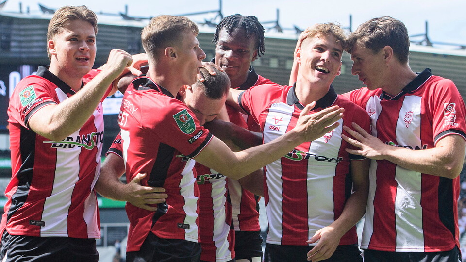 Lincoln City celebrate during the Carabao Cup win over Derby County