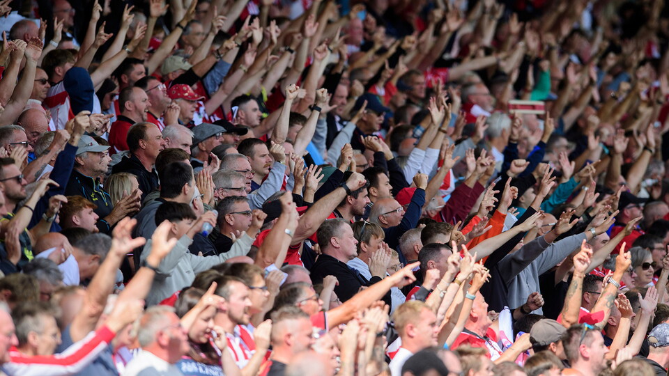 Lincoln fans cheer their team on in the GBM Stand