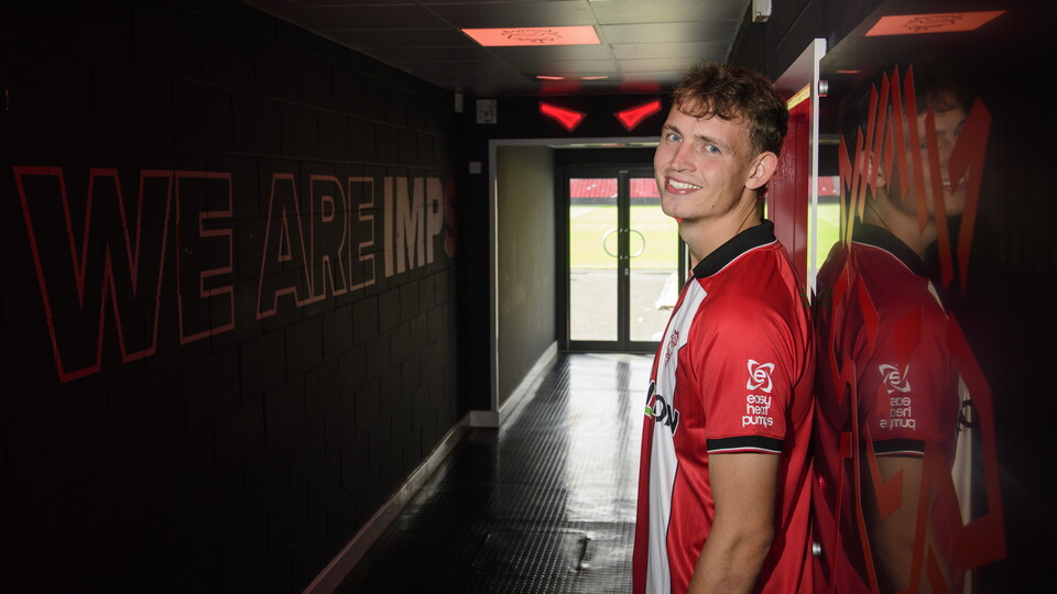 Mikkel Ladefoged stands in a darkened tunnel