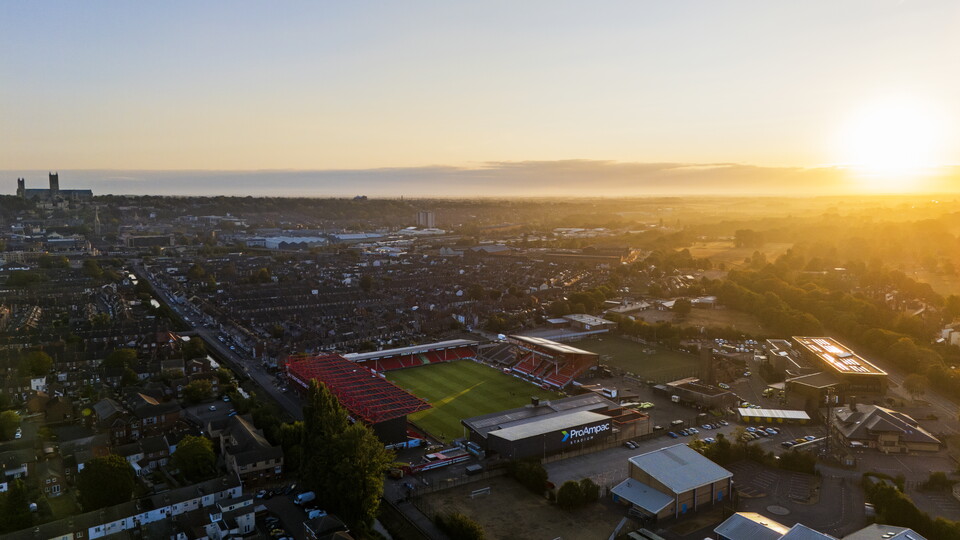 A view of ProAmpac Stadium with the sun rising