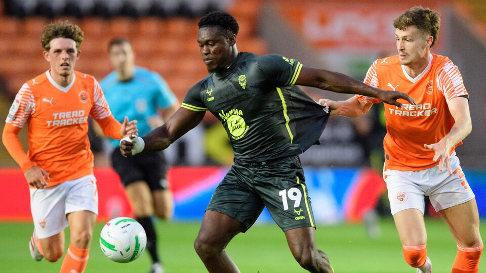 Tanto Olaofe battles for the ball