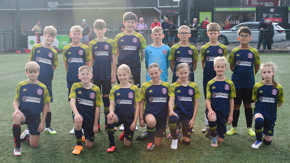 Ruskington Lions U12s pictured on the 3G pitch outside the ProAmpac Stadium