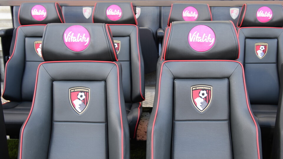 Seats with a Bournemouth logo on