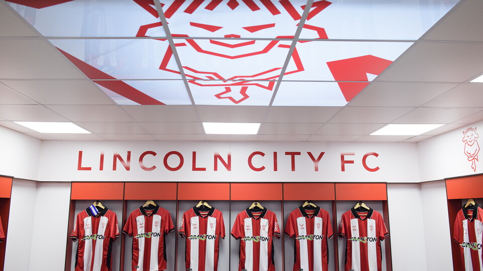 Shirts hung up in a changing room